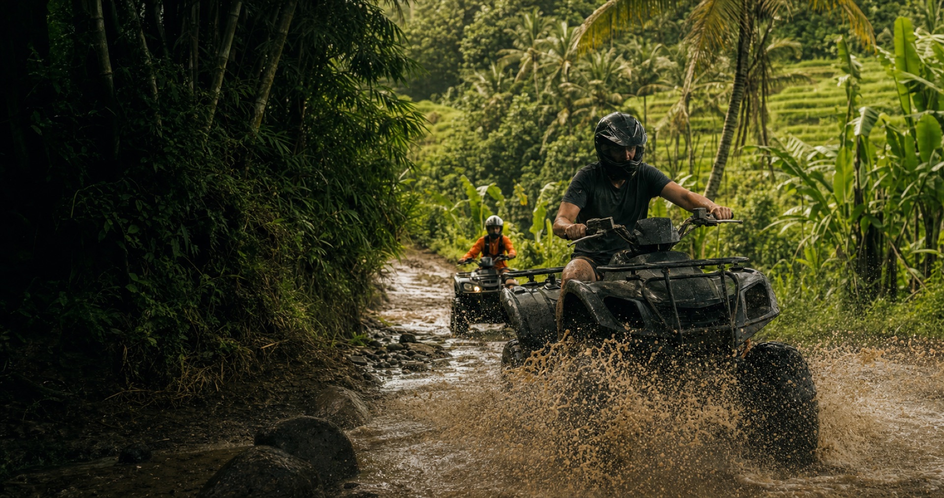 ATV riders crossing a muddy tropical trail in the Ubud countryside